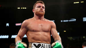 Boxing Champion Canelo Alvarez In Mid-fight Punch Wallpaper