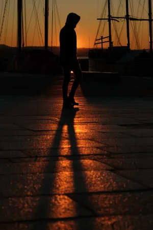 Boy Shadow Cast On The Ground Wallpaper