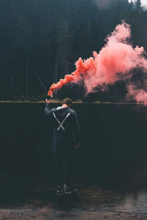 Boy Smoke Near Lake Wallpaper