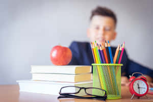 Boy With Back To School Supplies Wallpaper