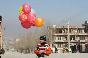 Boy With Balloons Kabul Wallpaper