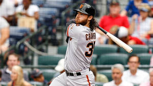 Brandon Crawford Hitting With Bat Wallpaper