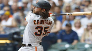 Brandon Crawford Holding A Bat Wallpaper