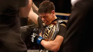 Brandon Moreno Crying Holding Belt Wallpaper