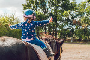 Brave Young Equestrian Wallpaper