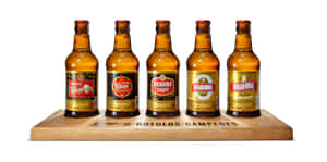 Brazilian Brahma Beer Bottles On Flight Tray Wallpaper