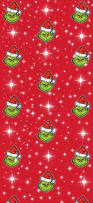 Breathe In The Spirit Of Christmas With This Cheery Cute Grinch. Wallpaper