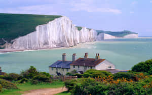 Breathtaking View Of The Seven Sisters Cliff In England Wallpaper