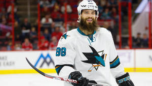 Brent Burns Smiling In His San Jose Sharks Jersey Wallpaper