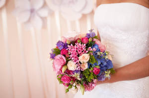 Bride With Colorful Bouquet Of Flowers Wallpaper