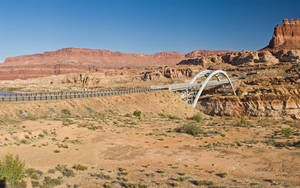 Bridge In Desert Mountains Wallpaper