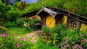 Bright And Cosy Yellow Hobbit House Wallpaper