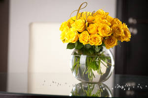 Bright Yellow Roses In Flower Vase Wallpaper