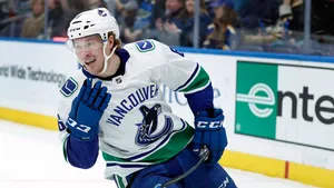 Brock Boeser Ice Hockey Game Winnipeg Jets Wallpaper