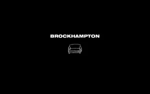 Brockhampton Posing In Front Of A Painted Wall Wallpaper