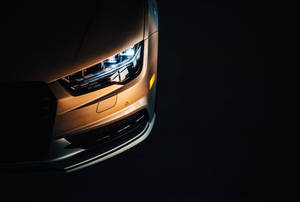 Bronze Audi Headlight Wallpaper