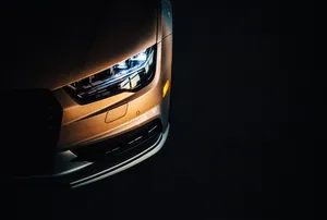 Bronze Audi Headlight Wallpaper