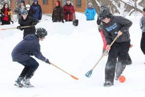 Broomball Young Boy And Man Wallpaper