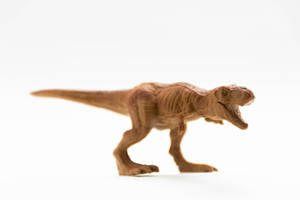 Brown Dinosaur Toy Wallpaper
