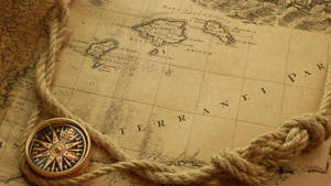 Brown Vintage Compass On Old Map Wallpaper