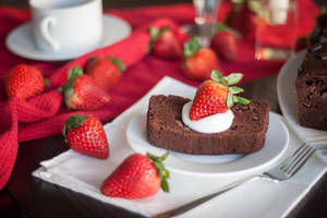 Brownie With Cream And Strawberry Wallpaper