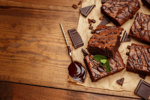 Brownies With Chocolates And Coffee Beans Wallpaper