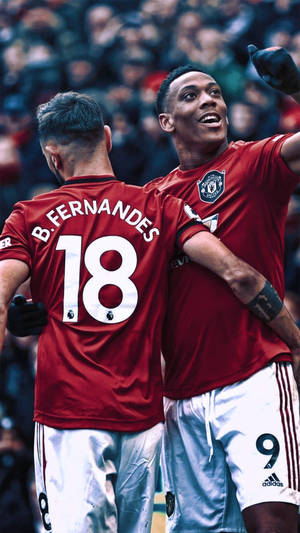 Bruno Fernandes Manchester United Hugs Teammate Wallpaper
