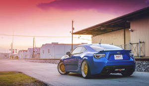 Brz Driving Past Houses Wallpaper