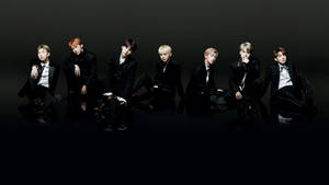 Bts Group Aesthetic Image On A Black Background Wallpaper