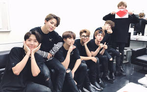 Bts Group Photo In Waiting Room Wallpaper