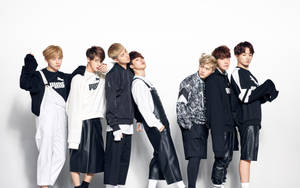 Bts Group Photo Puma Outfit Wallpaper
