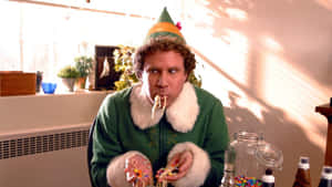 Buddy The Elf, Celebrating The Christmas Season In The North Pole Wallpaper