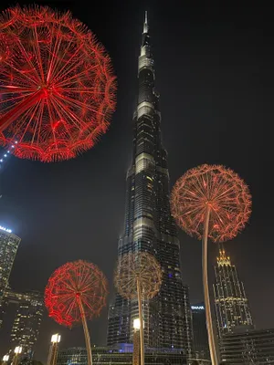 Burj Khalifa With Giant Dandelion Installations Wallpaper