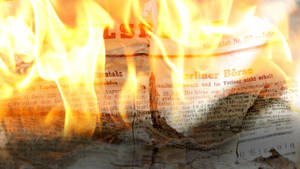 Burning Newspaper Wallpaper
