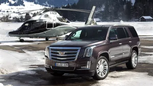 Cadillac Escalade In Snow Wallpaper