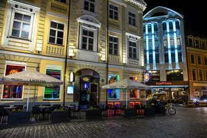 Cafe Street At Night In Riga Wallpaper