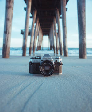 Camera In The White Sand Wallpaper