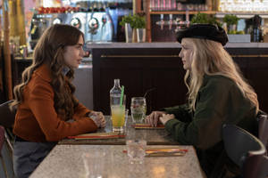 Camille And Emily In Paris Lunch Scene Wallpaper