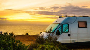 Camping Van On The Beach Wallpaper