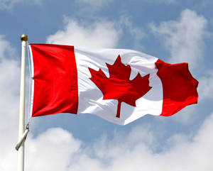 Canada Flag And Clouds Wallpaper