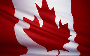 Canada Flag In Cloth Wallpaper