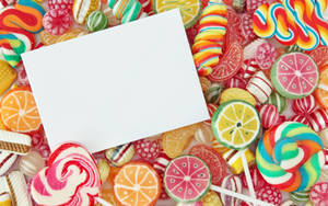 Candies With A Card Wallpaper