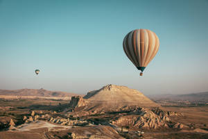 Cappadocia Balloons Near Hill Wallpaper