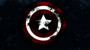Captain America's Iconic Shield Covered In Battle Stains Wallpaper