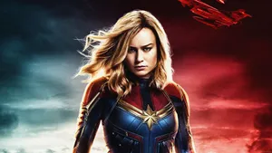 Captain Marvel 4k Blue And Red Background Wallpaper