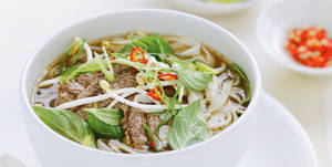 Caption: A Tempting Bowl Of Traditional Vietnamese Pho. Wallpaper