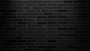 Caption: Aesthetic Monochrome Dark Brick Wall Wallpaper