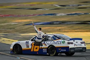 Caption: Aj Allmendinger Victorious Celebration Wallpaper