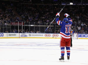 Caption: Artemi Panarin Celebrating A Victory On Ice Wallpaper