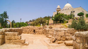 Caption: Astonishing View Of The Historic Cave Of The Seven Sleepers - Jordan Wallpaper